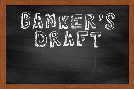 Banker's Draft written on chalk board
